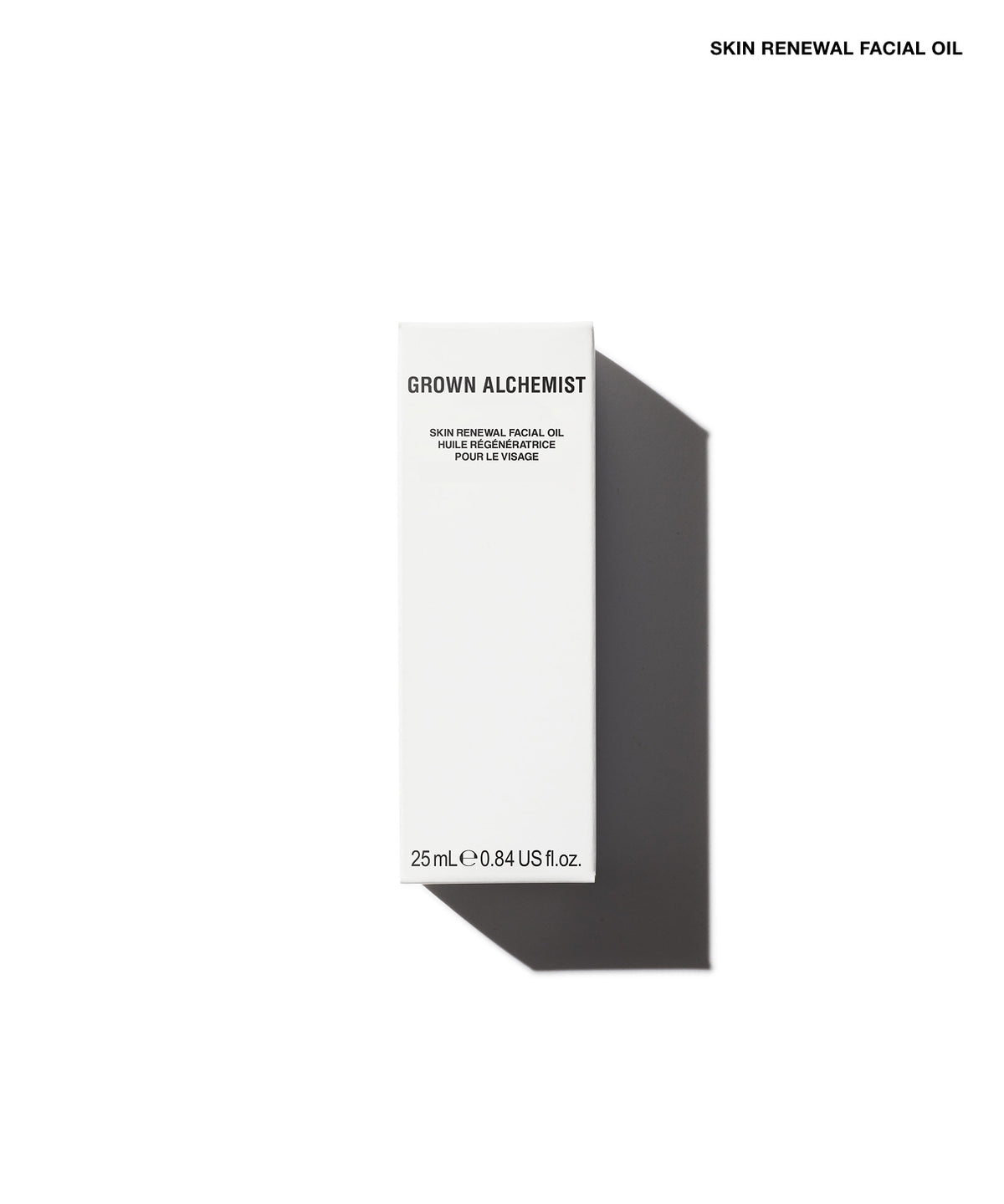 A tall white rectangular box labeled 'GROWN ALCHEMIST' and 'SKIN RENEWAL FACIAL OIL' on a clean white background, with a dark cast shadow to the right.