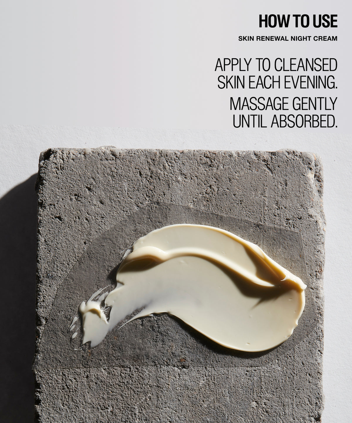 A product usage graphic for 'Skin Renewal Night Cream' showing a thick swatch of the cream on a textured gray stone slab against a white background, with instructions on how to apply it.