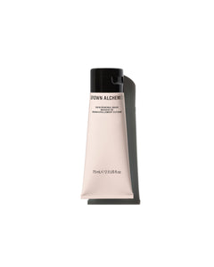 Skincare tube with 'Grown Alchemist' branding on a white background