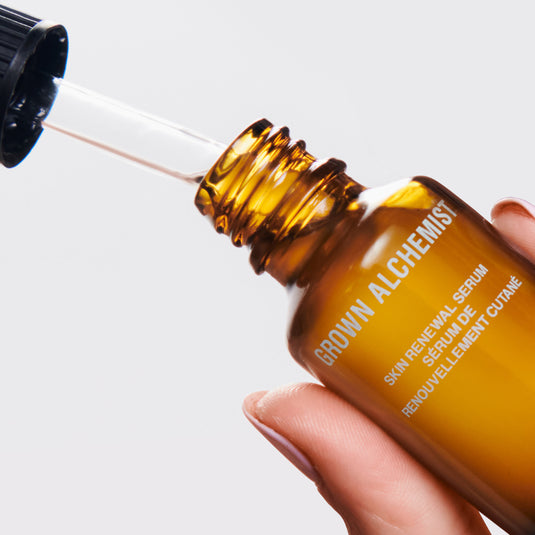 Grown Alchemist skincare serum bottle with dropper on a white background