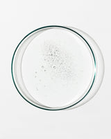 Clear glass lid with bubbles on a white background