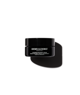 A black jar of Grown Alchemist Regenerating Night Cream .