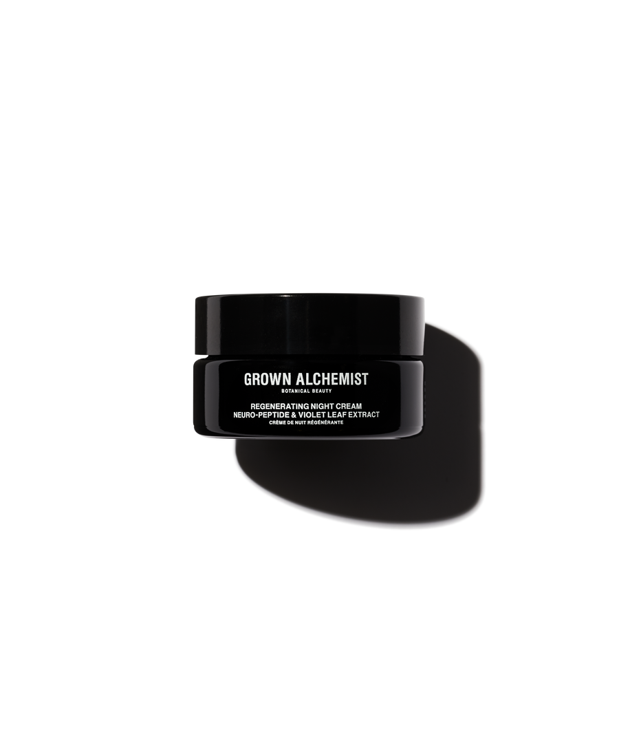 A black jar of Grown Alchemist Regenerating Night Cream .