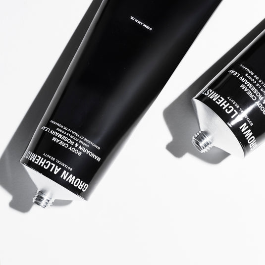 Two tubes of Grown Alchemist cream against a white background